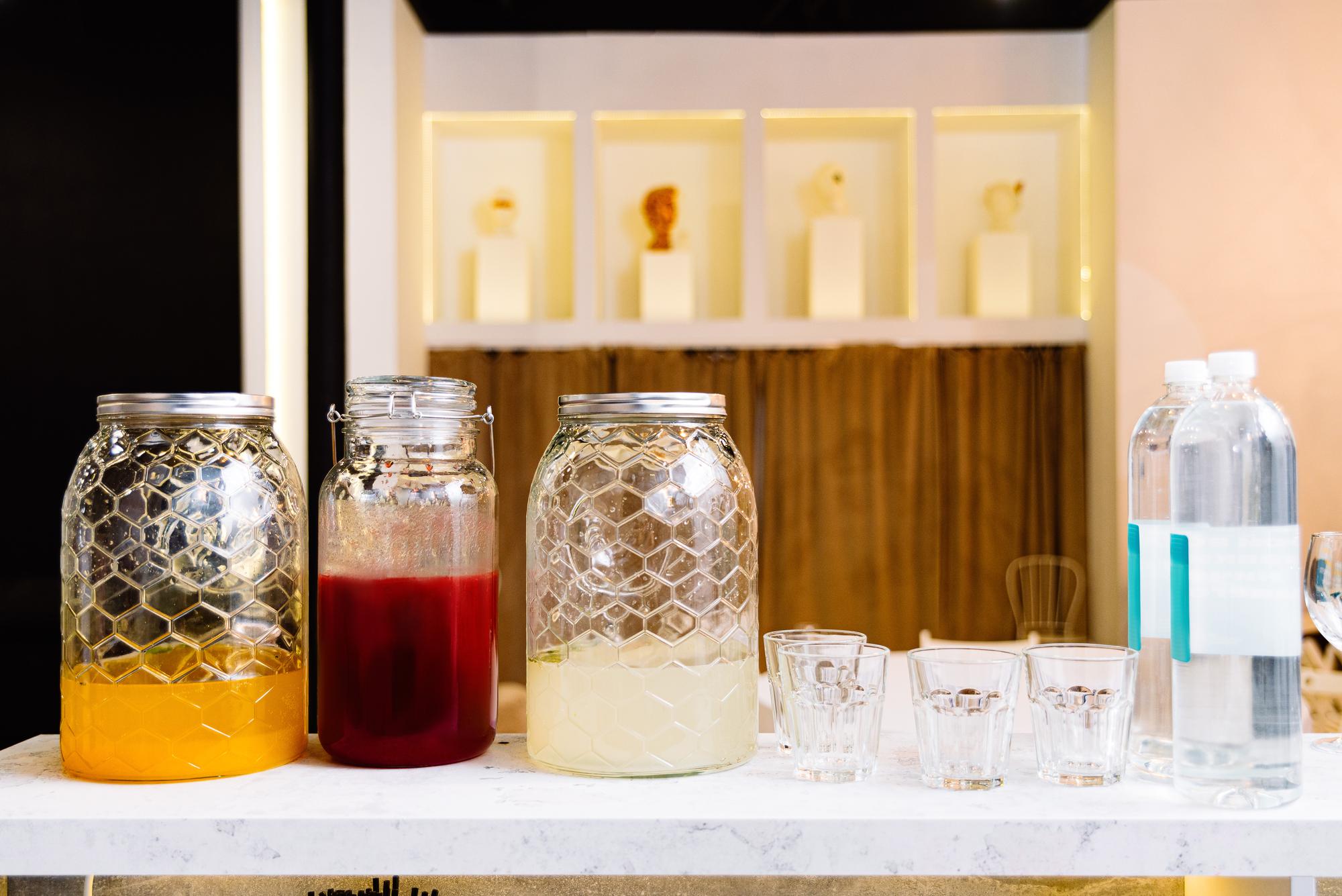 Fermentation jars on shelf in studio with labels